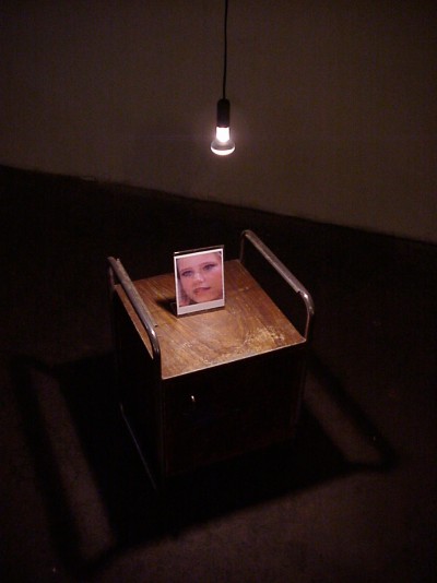 Night table, detail; part of the video installation Pay Per View, 2001