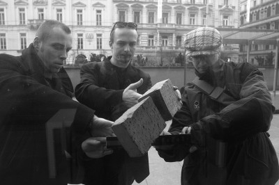 Members of Pode Bal installing the exterior half of the brick, facade of the National Gallery, February 2002.